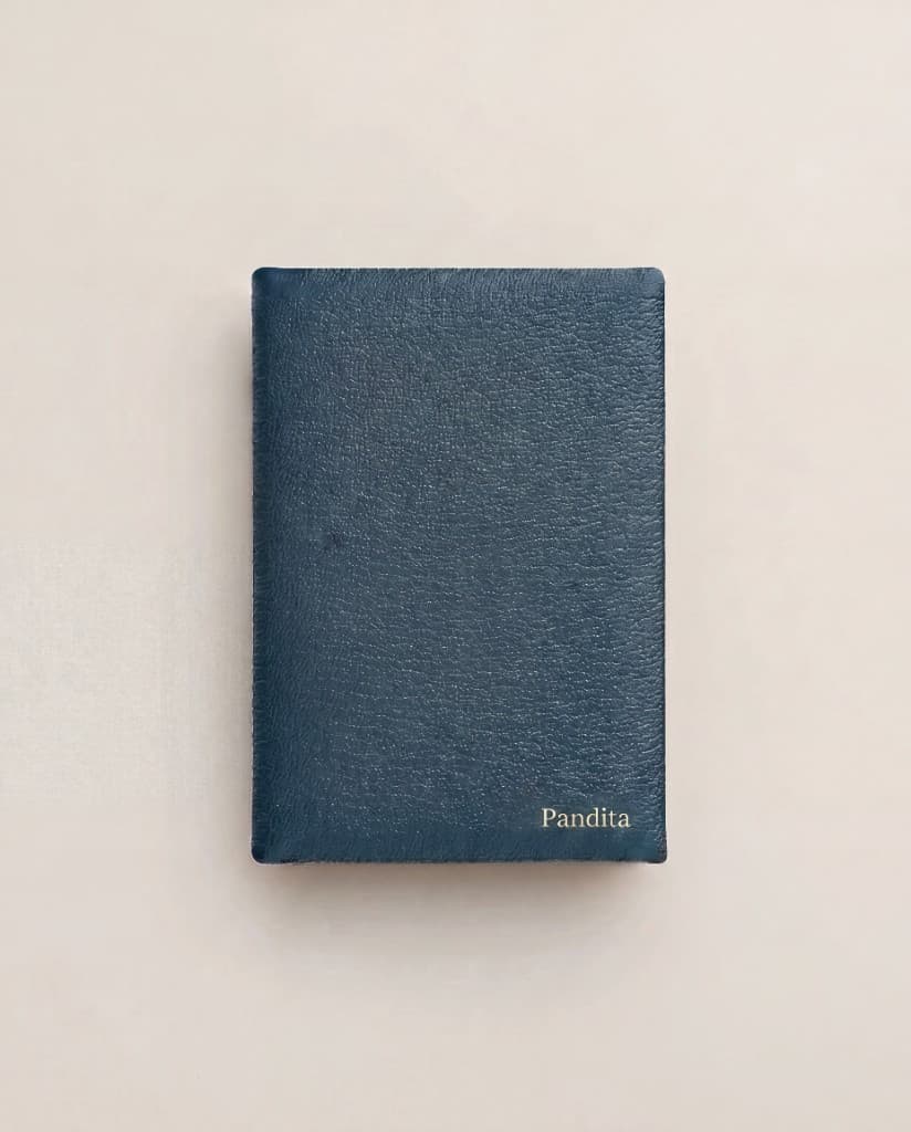 Navy leather notebook with Pandita wordmark foil stamp